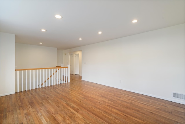 empty room featuring hardwood / wood-style floors