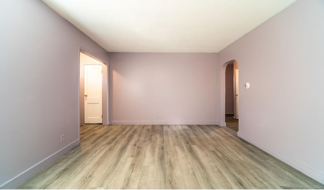 empty room with light wood-type flooring