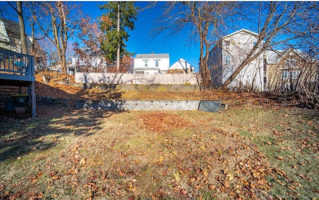 view of yard with a wooden deck