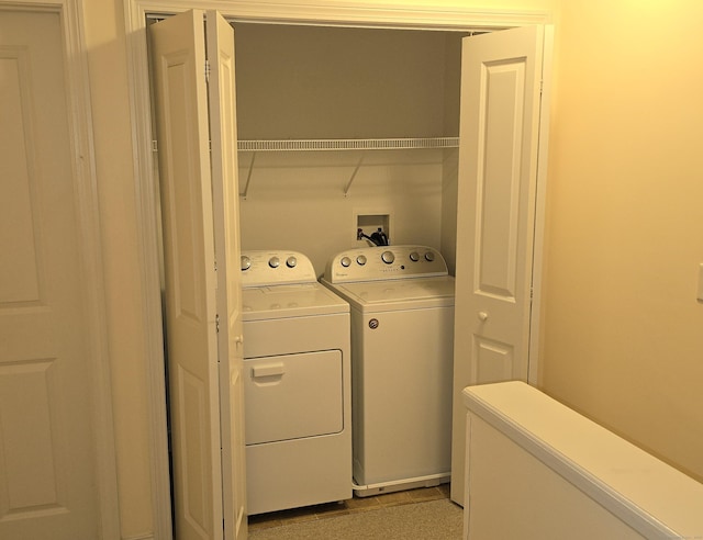 laundry area featuring independent washer and dryer