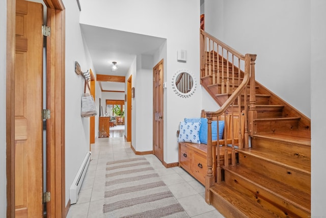 interior space featuring a baseboard radiator and light tile patterned floors