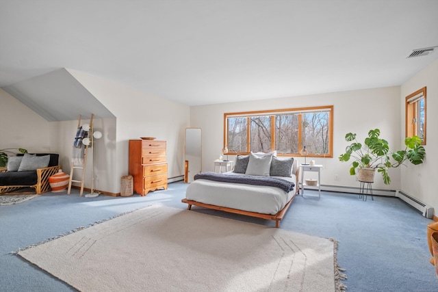 carpeted bedroom with a baseboard heating unit