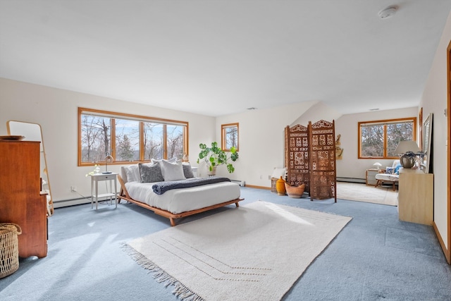 carpeted bedroom featuring a baseboard radiator