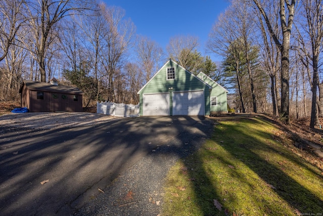 view of side of property with a garage