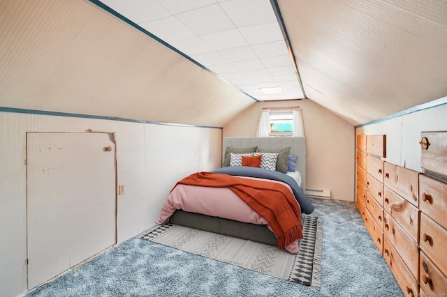 bedroom with carpet flooring, a baseboard radiator, and lofted ceiling