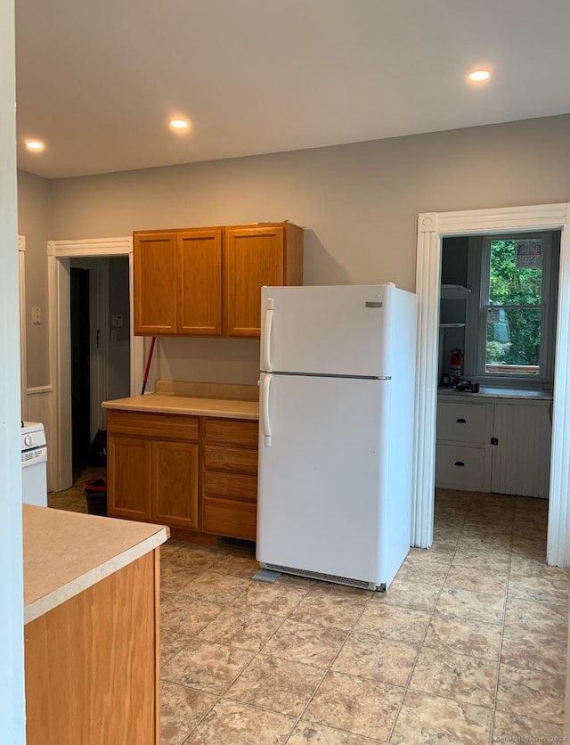 kitchen featuring white refrigerator