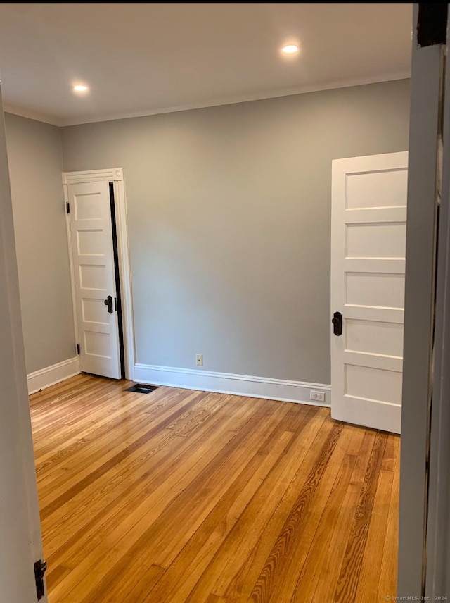 empty room featuring light hardwood / wood-style floors