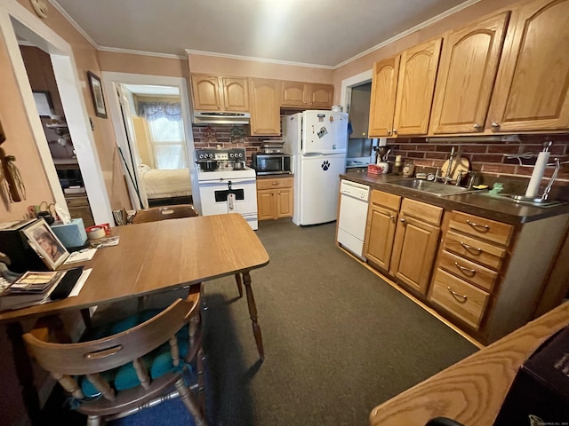 kitchen with light brown cabinets, sink, tasteful backsplash, crown molding, and white appliances