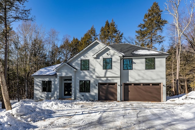 view of front of home with an attached garage