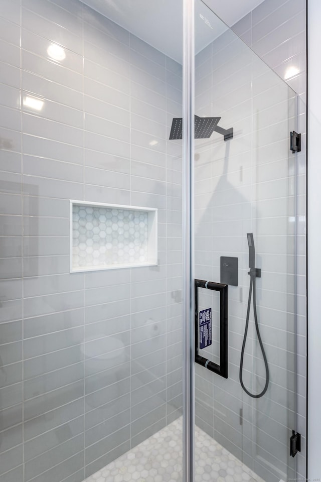 bathroom featuring a stall shower