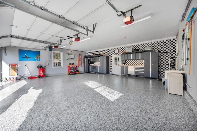 23 Olmstead Rd, East Haddam, CT 06423 - garage with a garage door opener and an AC wall unit