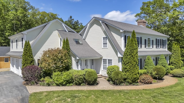 23 Olmstead Rd, East Haddam, CT 06423 - view of front of home with a chimney, driveway, a garage, roof with shingles, and a gambrel roof