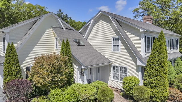 23 Olmstead Rd, East Haddam, CT 06423 - view of side of home featuring a shingled roof, a gambrel roof, and a chimney