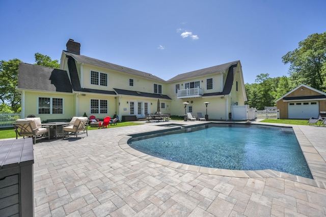 23 Olmstead Rd, East Haddam, CT 06423 - view of pool featuring a patio, french doors, a pool with connected hot tub, and a gate