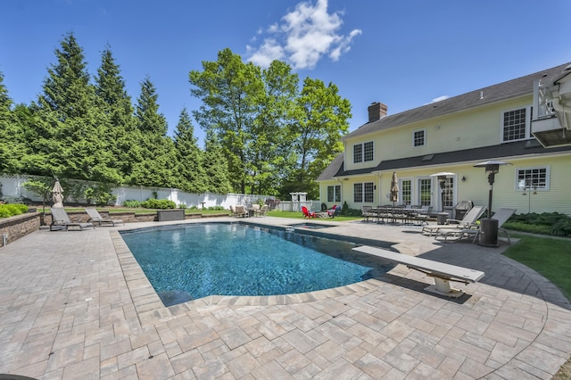 23 Olmstead Rd, East Haddam, CT 06423 - view of pool with a patio area, a fenced backyard, and a diving board