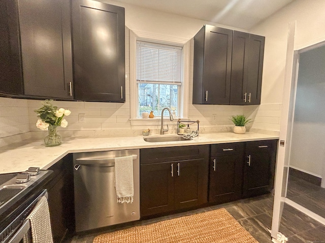 kitchen featuring decorative backsplash, stainless steel dishwasher, dark brown cabinetry, and sink