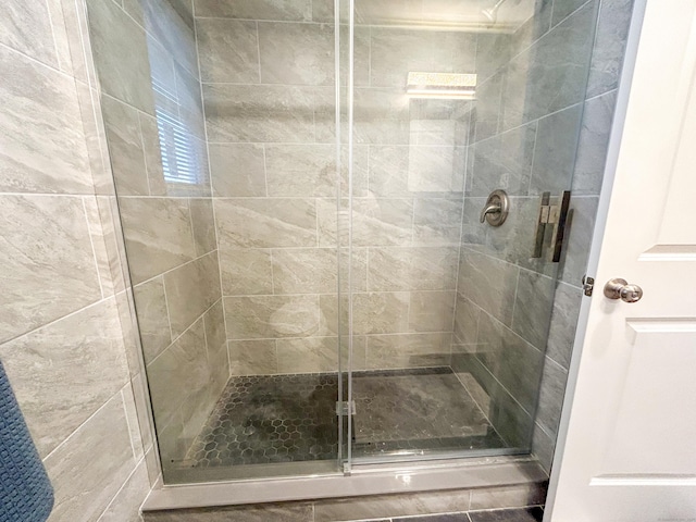 bathroom featuring walk in shower