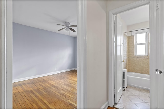 hall featuring light wood-type flooring