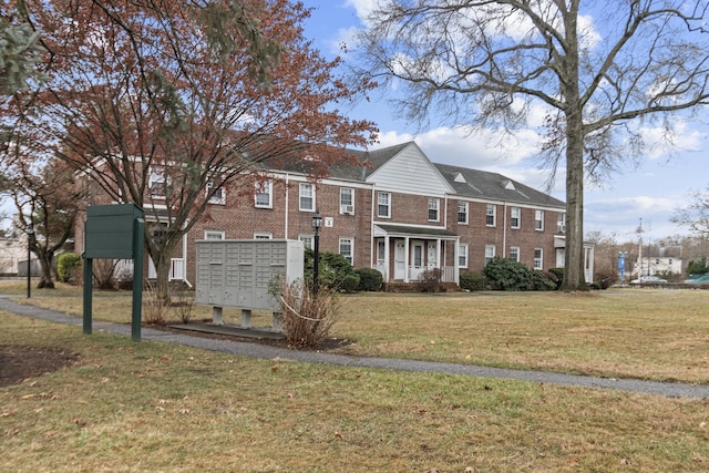 view of front facade with a front yard