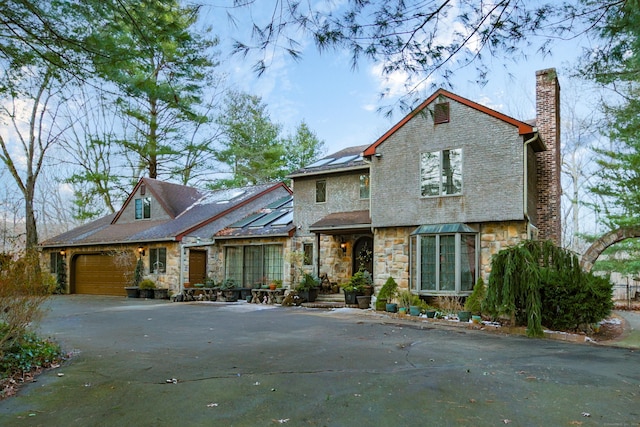 view of front of home with a garage