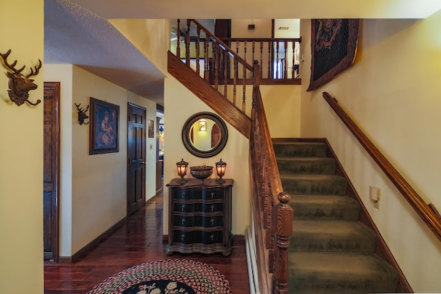 stairs with wood-type flooring