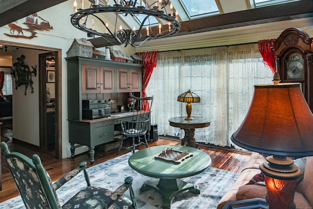 interior space featuring vaulted ceiling with beams, a notable chandelier, and hardwood / wood-style flooring