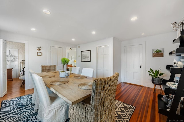 dining area with recessed lighting and wood finished floors