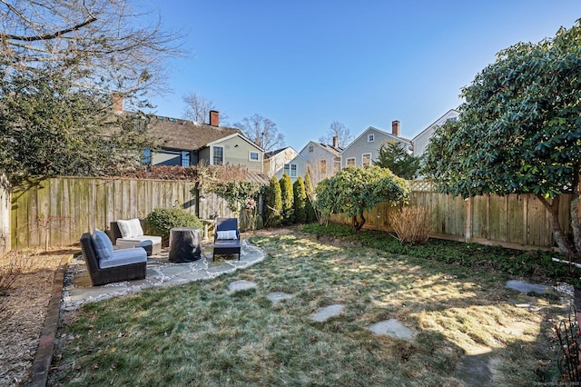 view of yard featuring a fenced backyard and a patio