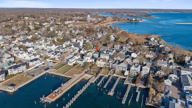 bird's eye view with a residential view and a water view