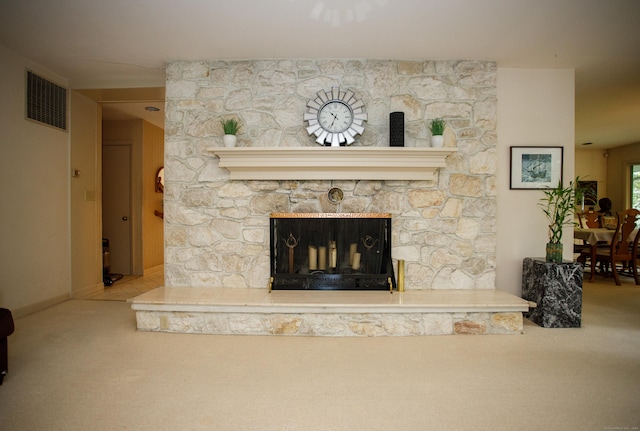 details with carpet and a stone fireplace