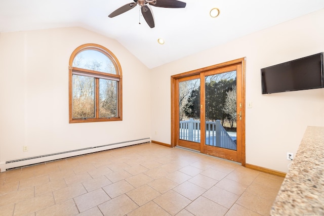 empty room featuring ceiling fan, lofted ceiling, and baseboard heating