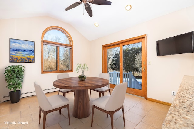 dining room featuring ceiling fan, light tile patterned floors, vaulted ceiling, and a baseboard heating unit