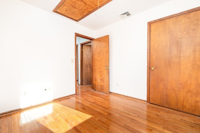 unfurnished bedroom with light hardwood / wood-style flooring