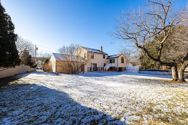 view of snow covered property