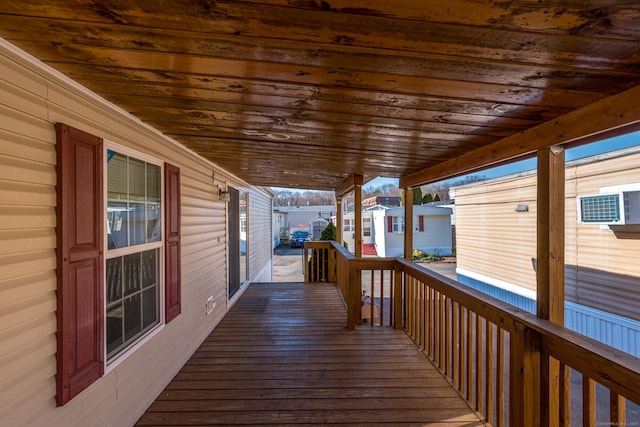 wooden terrace featuring covered porch