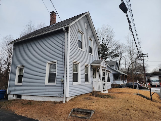 view of home's exterior featuring a lawn