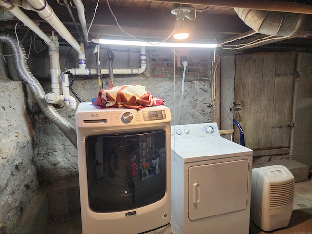 washroom with washer and clothes dryer