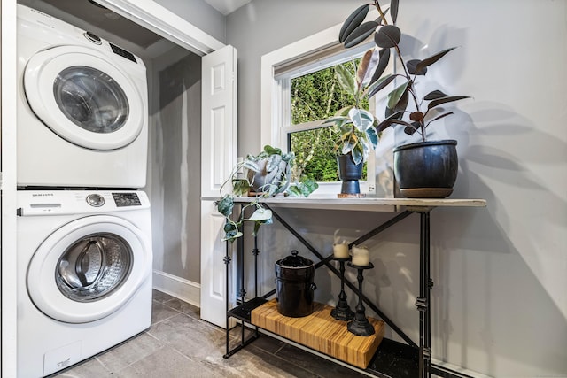 laundry area with stacked washer and dryer