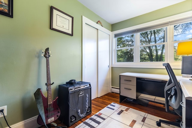 office area featuring a baseboard radiator and dark hardwood / wood-style floors