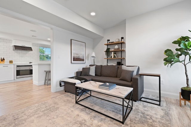 living room with light hardwood / wood-style floors