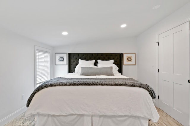 bedroom with light wood-type flooring