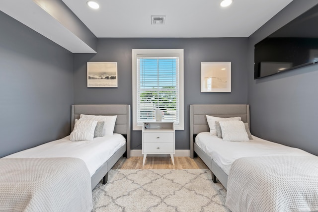 bedroom featuring light wood-type flooring