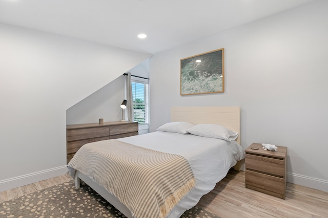 bedroom featuring light hardwood / wood-style flooring