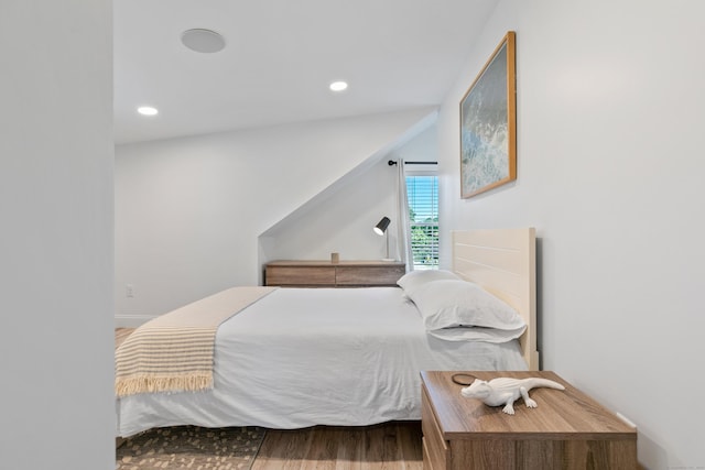 bedroom featuring hardwood / wood-style flooring