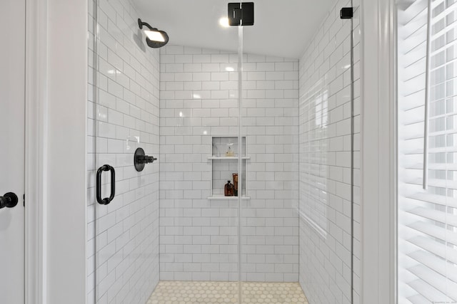 bathroom with an enclosed shower