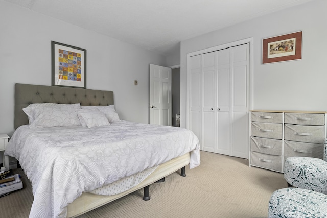 carpeted bedroom with a closet