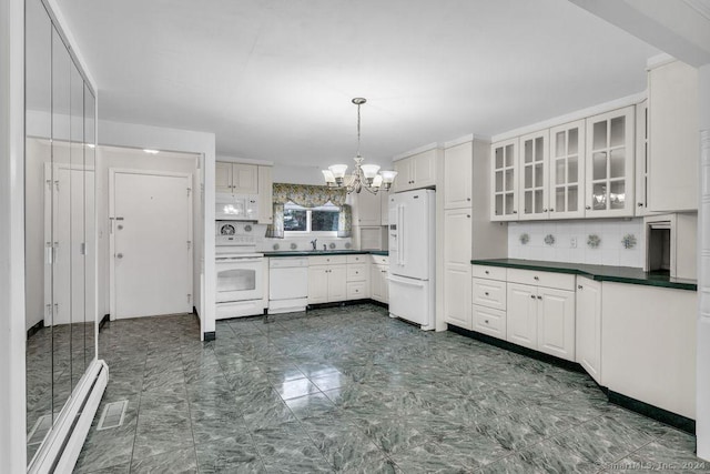 kitchen with pendant lighting, white appliances, tasteful backsplash, and white cabinetry