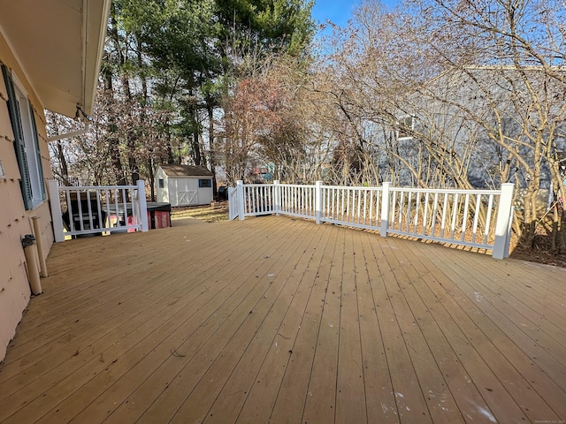 wooden deck with a shed