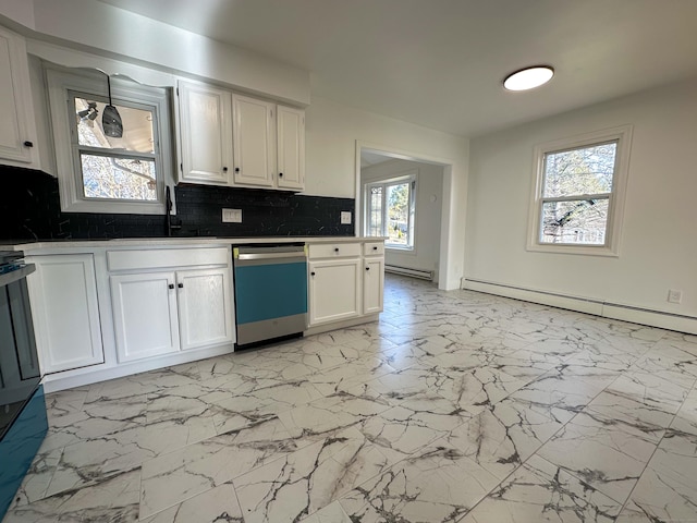 kitchen with sink, stainless steel dishwasher, a baseboard heating unit, backsplash, and white cabinets