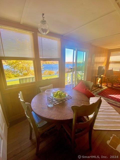 dining room with hardwood / wood-style flooring